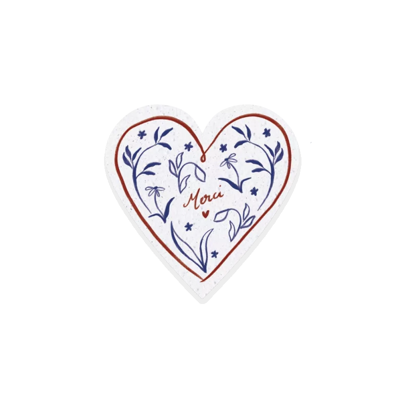 Carte à planter cœur “Merci” – un remerciement fleuri aux accents rouge et bleu, imaginé par Coconut & Roses.